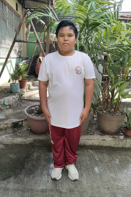 An unsponsored boy named Ter from Philippines who has waited 374 days for a sponsor.