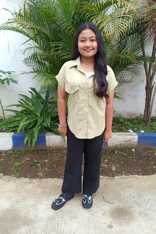 An unsponsored girl named Aywa from Indonesia who has waited 22 days for a sponsor.