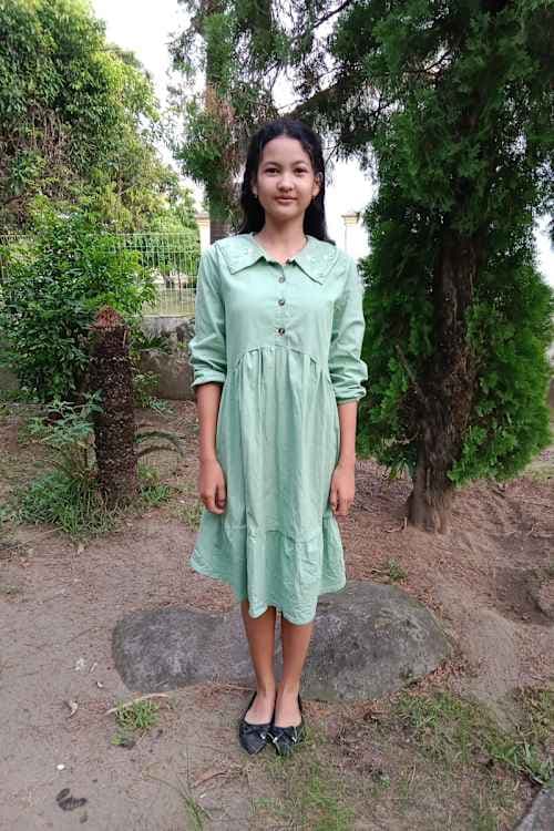 An unsponsored girl named Bethrees from Indonesia who has waited 330 days for a sponsor.