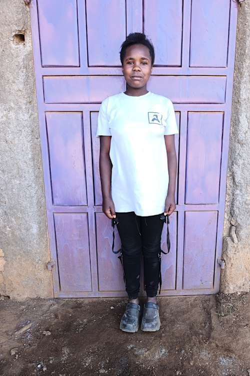 An unsponsored girl named Muthoni from Kenya who lives in an AIDS-affected area and has waited 594 days for a sponsor.
