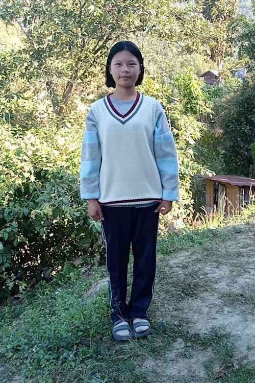 An unsponsored girl named Noot from Thailand who has waited 156 days for a sponsor.