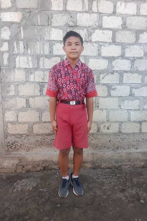 An unsponsored boy named Ano from Indonesia who has waited 517 days for a sponsor.