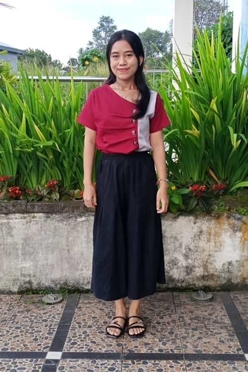 An unsponsored girl named Gracia from Indonesia who has waited 13 days for a sponsor.
