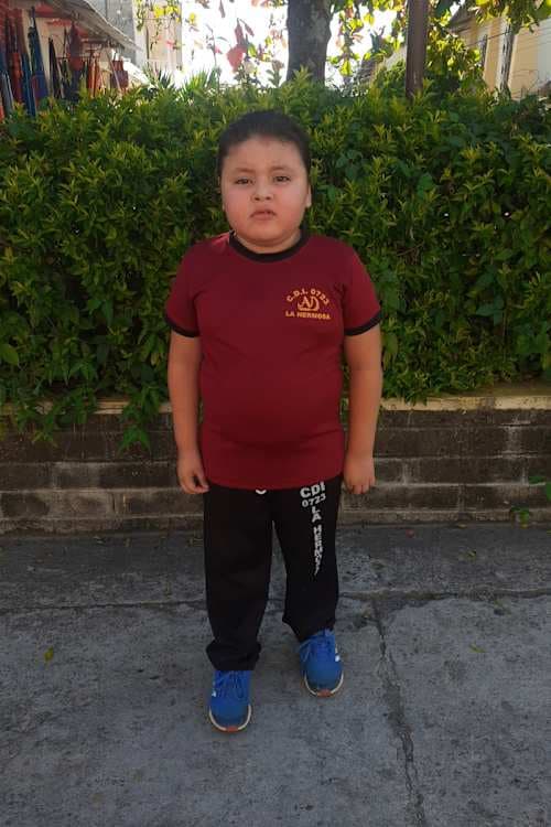 An unsponsored boy named Cristian from El Salvador who has waited 600 days for a sponsor.