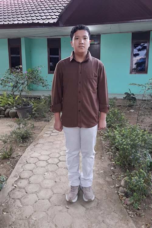 An unsponsored boy named Gebi from Indonesia who has waited 326 days for a sponsor.