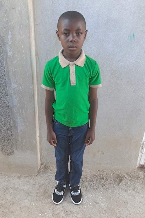 An unsponsored boy named Dabens from Haiti who is vulnerable to exploitation and has waited 558 days for a sponsor.