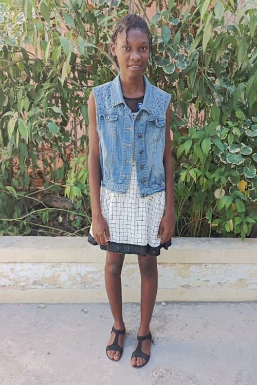 An unsponsored girl named Maniolie from Haiti who is vulnerable to exploitation and has waited 688 days for a sponsor.