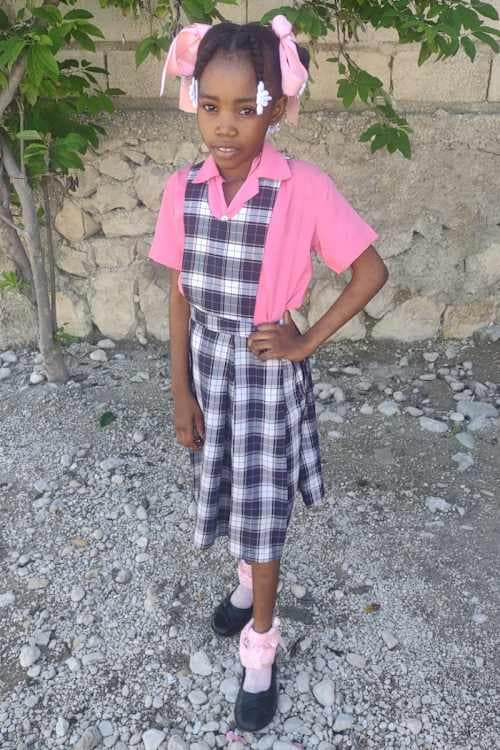 An unsponsored girl named Anne Lia from Haiti who is vulnerable to exploitation and has waited 778 days for a sponsor.