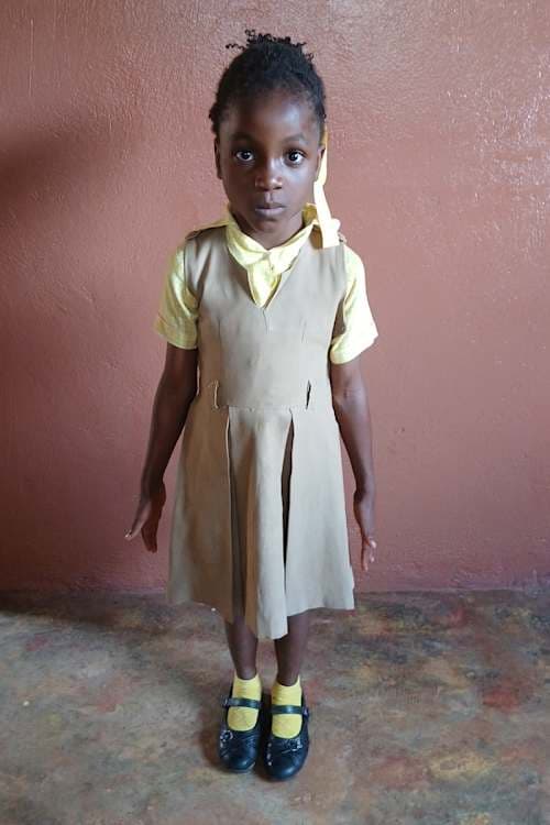 An unsponsored girl named Bergeline from Haiti who is vulnerable to exploitation and has waited 175 days for a sponsor.