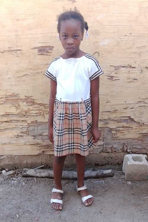 An unsponsored girl named Lea from Haiti who is vulnerable to exploitation and has waited 902 days for a sponsor.
