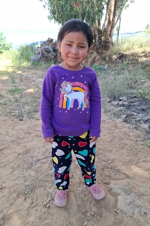 An unsponsored girl named Sarai from Bolivia who has waited 421 days for a sponsor.