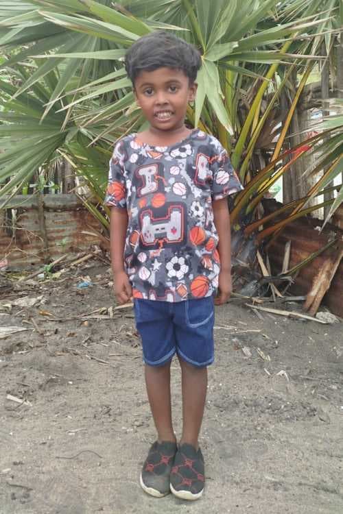 An unsponsored boy named Okitha from Sri Lanka who has waited 600 days for a sponsor.