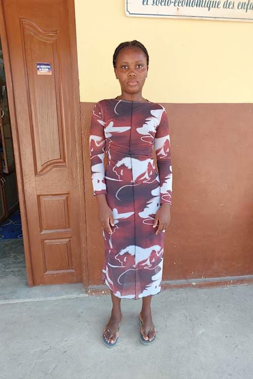 An unsponsored girl named Noelie from Togo who lives in an AIDS-affected area, is vulnerable to exploitation and has waited 293 days for a sponsor.