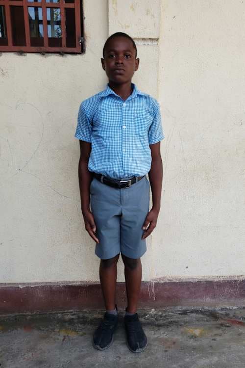 An unsponsored boy named May Kender from Haiti who is vulnerable to exploitation and has waited 588 days for a sponsor.