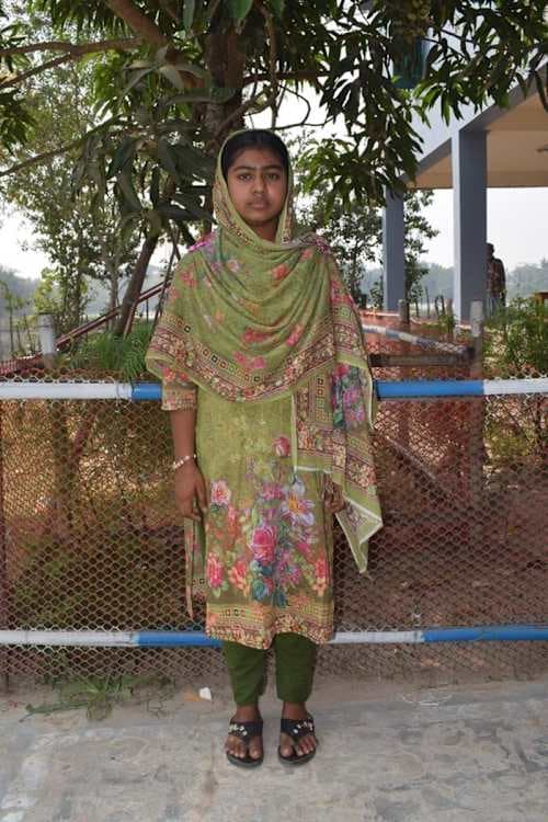 An unsponsored girl named Moriom from Bangladesh who is vulnerable to exploitation and has waited 351 days for a sponsor.