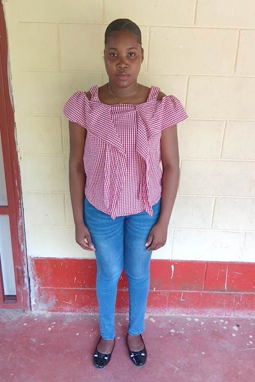 An unsponsored girl named Dania from Haiti who is vulnerable to exploitation and has waited 679 days for a sponsor.