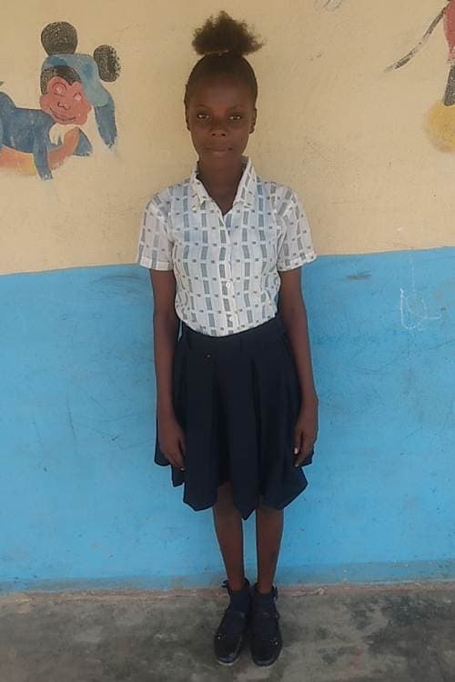 An unsponsored girl named Dorina from Haiti who is vulnerable to exploitation and has waited 466 days for a sponsor.