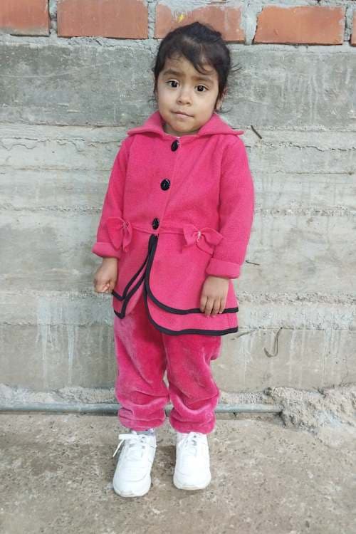 An unsponsored girl named Giorgina from Peru who has waited 609 days for a sponsor.