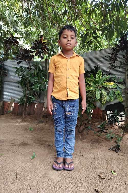 An unsponsored boy named Vishnu from Sri Lanka who has waited 547 days for a sponsor.