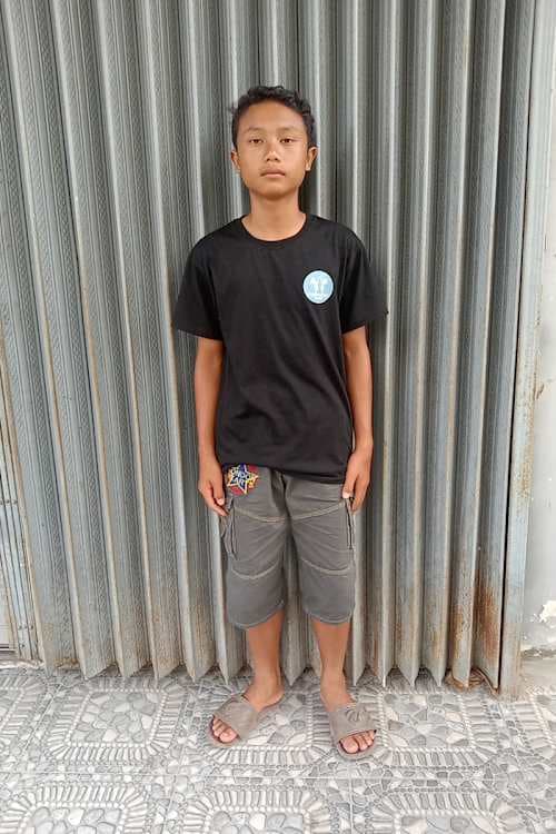 An unsponsored boy named Ipan from Indonesia who has waited 594 days for a sponsor.