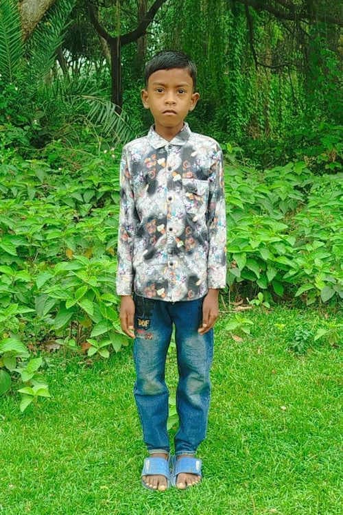 An unsponsored boy named Sujoy from Bangladesh who is vulnerable to exploitation and has waited 550 days for a sponsor.