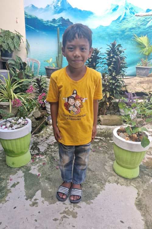 An unsponsored boy named Vano from Indonesia who has waited 565 days for a sponsor.