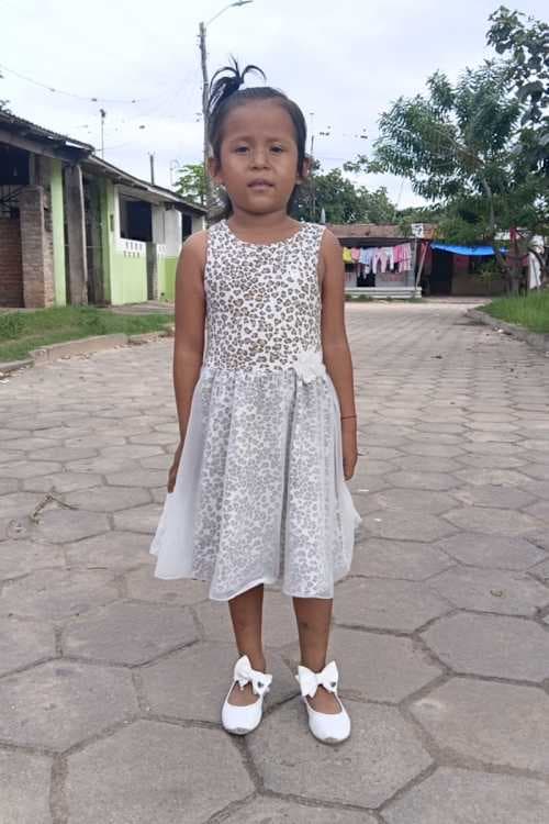 An unsponsored girl named Carla from Bolivia who has waited 579 days for a sponsor.
