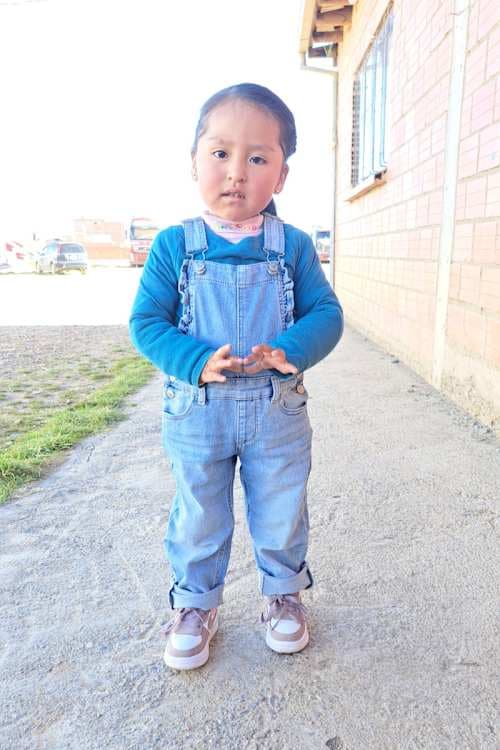 An unsponsored girl named Michelle from Bolivia who has waited 590 days for a sponsor.