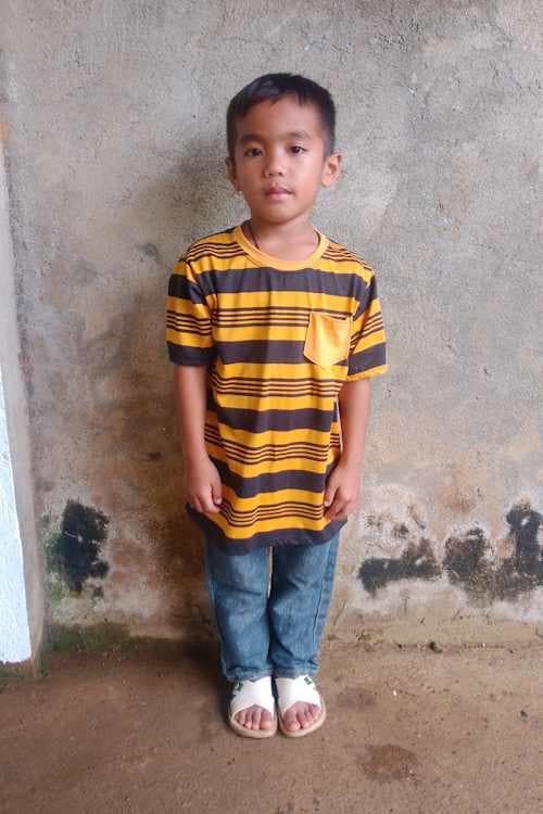 An unsponsored boy named Rex from Philippines who has waited 590 days for a sponsor.