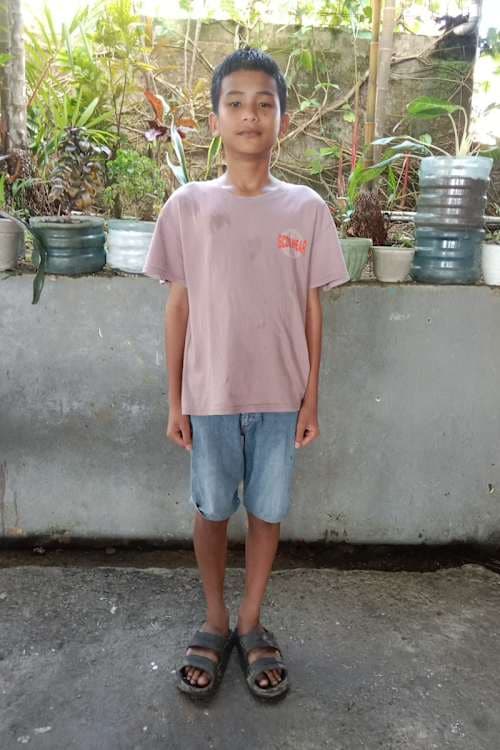 An unsponsored boy named Jo from Indonesia who has waited 505 days for a sponsor.