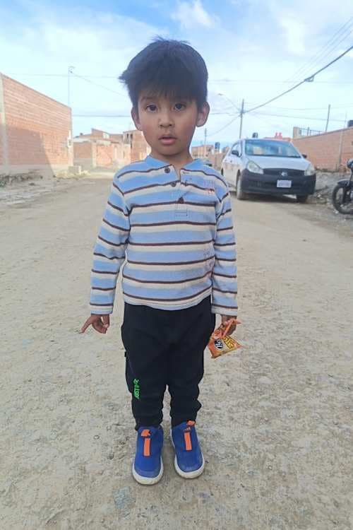 An unsponsored boy named Elian from Bolivia who has waited 617 days for a sponsor.