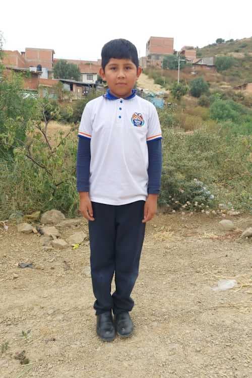 An unsponsored boy named Jhomar from Bolivia who has waited 599 days for a sponsor.
