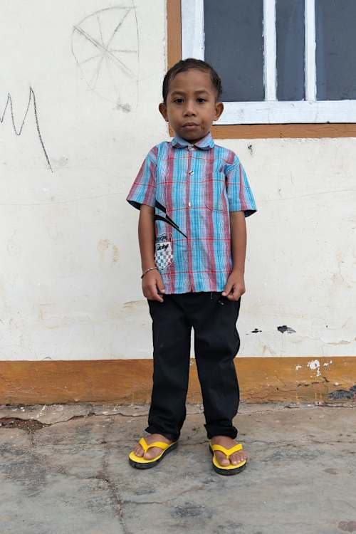 An unsponsored boy named Ledo from Indonesia who has waited 601 days for a sponsor.