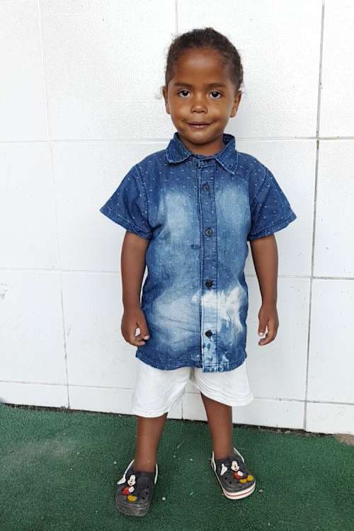 An unsponsored boy named Caio from Brazil who has waited 623 days for a sponsor.