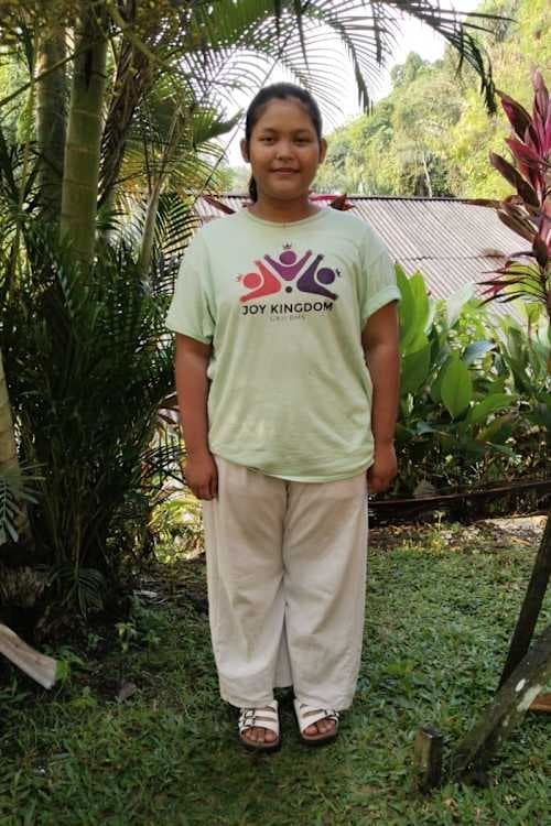 An unsponsored girl named Jois from Indonesia who has waited 425 days for a sponsor.