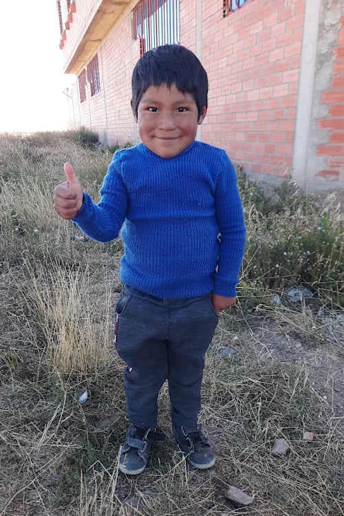 An unsponsored boy named Esnaider from Bolivia who has waited 604 days for a sponsor.