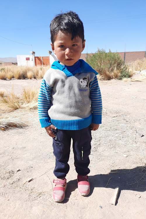 An unsponsored boy named Dimar from Bolivia who has waited 608 days for a sponsor.