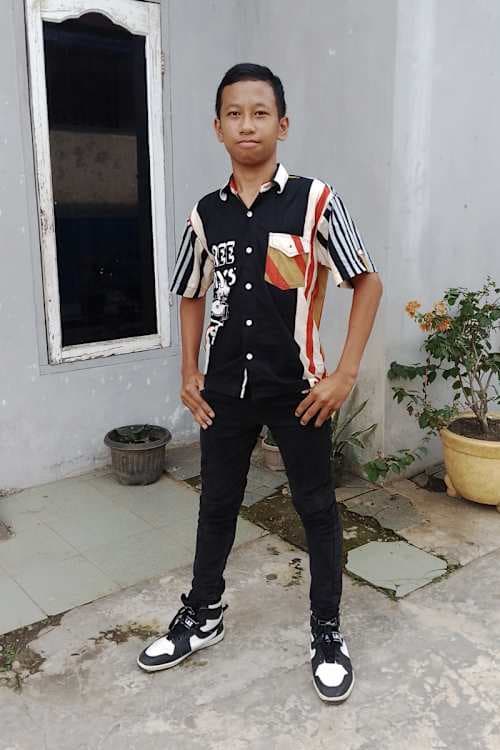 An unsponsored boy named Joe from Indonesia who has waited 308 days for a sponsor.