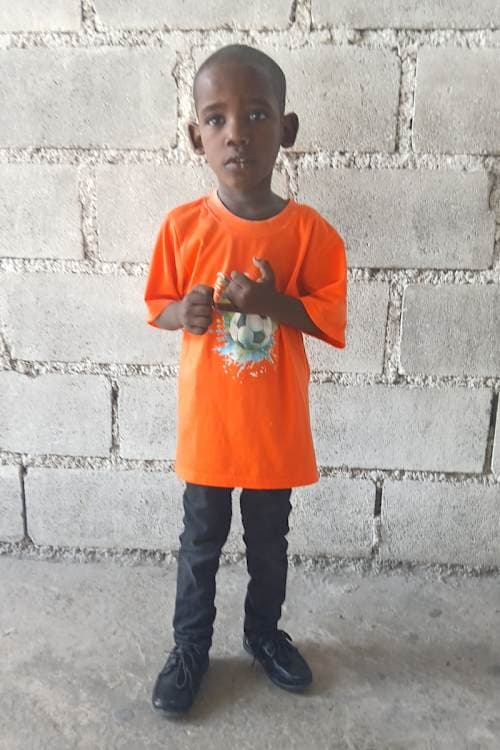 An unsponsored boy named Emmanuel from Haiti who is vulnerable to exploitation and has waited 389 days for a sponsor.