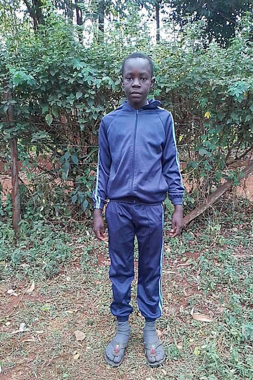 An unsponsored boy named Shorn from Kenya who lives in an AIDS-affected area and has waited 547 days for a sponsor.