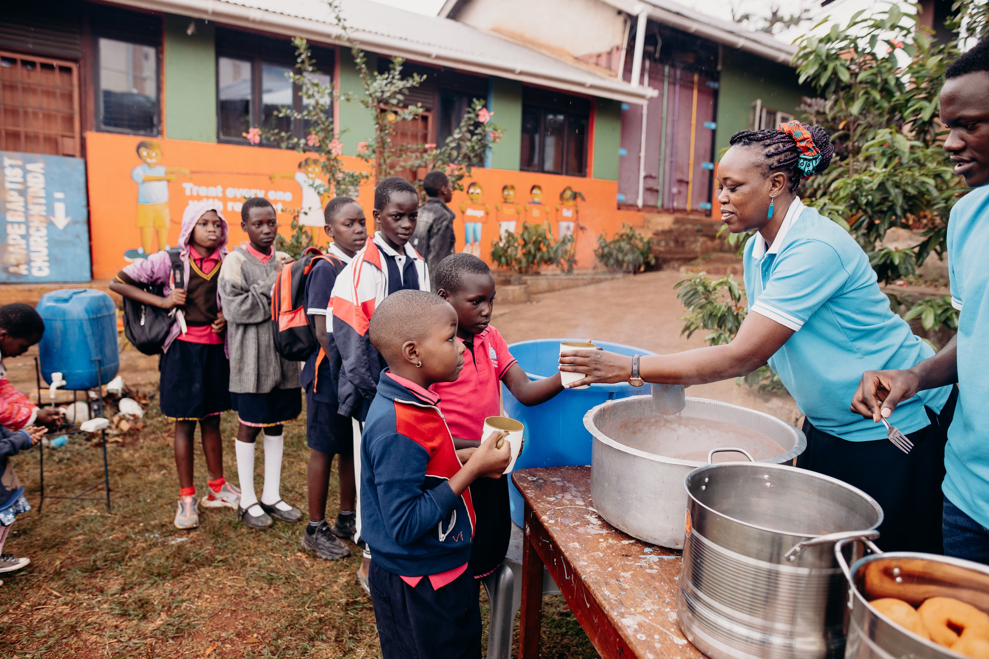 A local church provides food to children.