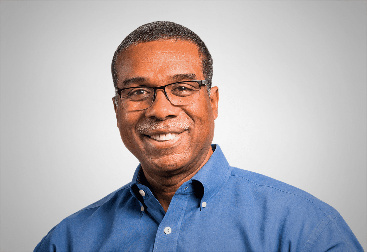 Smiling portrait of Edouard Lassegue.