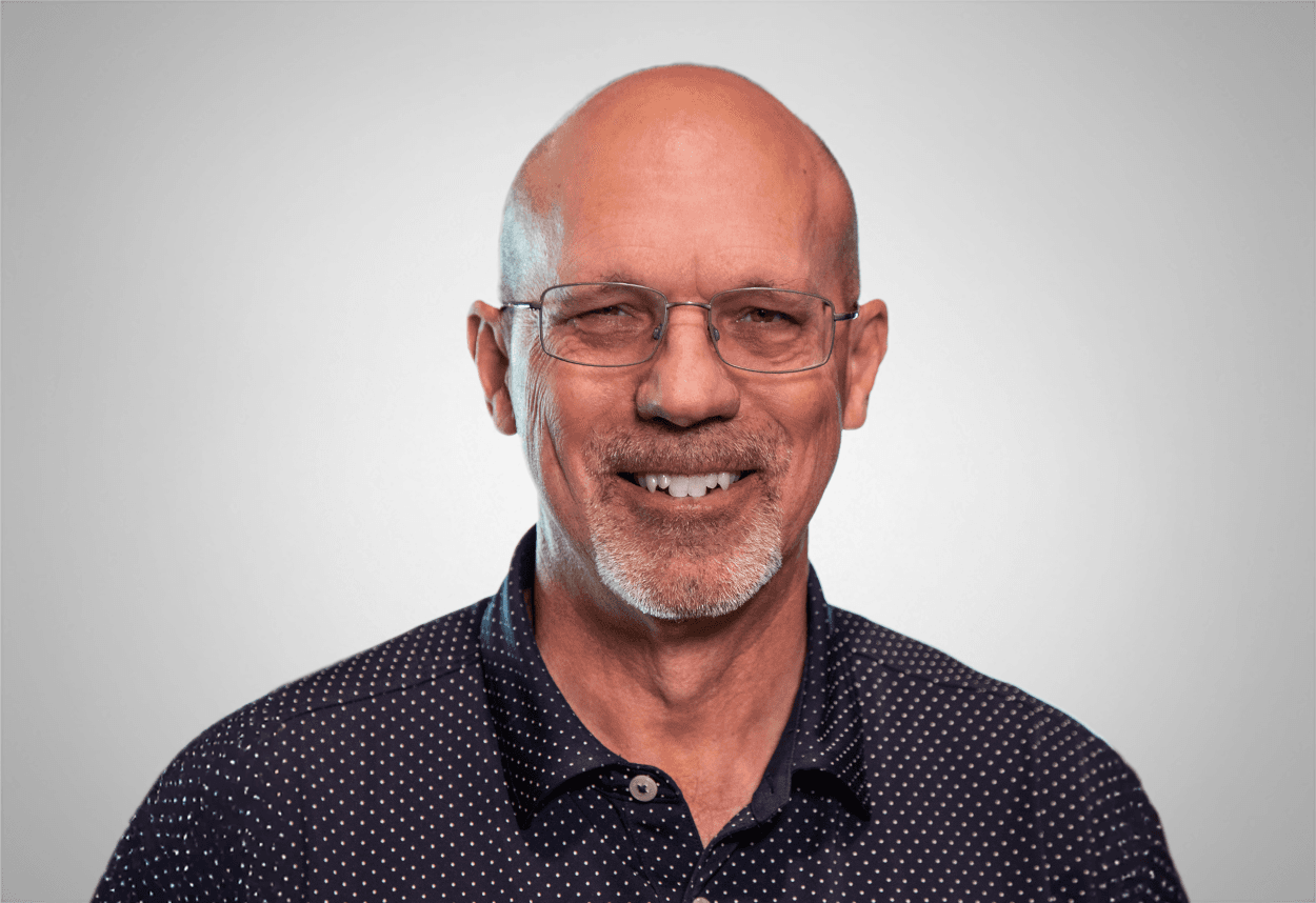 Smiling portrait of Tom Beck.