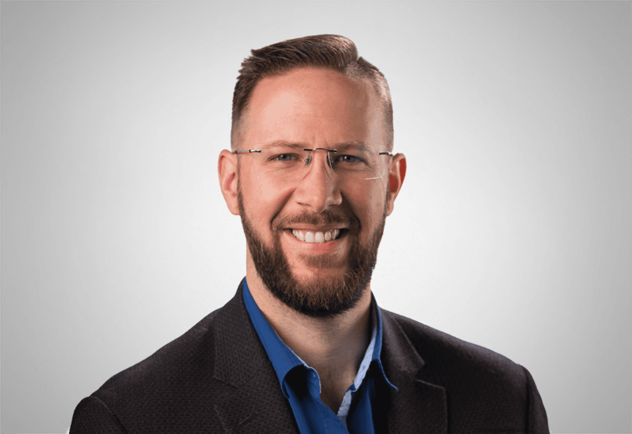 Smiling portrait of Brian Rhodes.