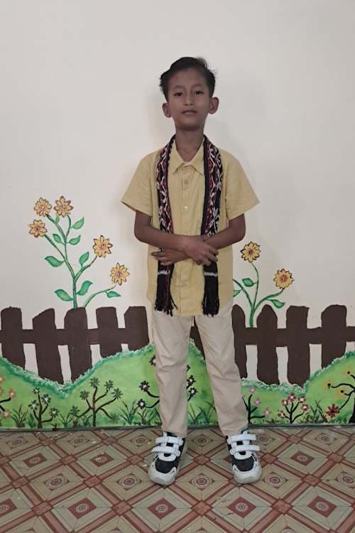 An unsponsored boy named Ondik from Indonesia who has waited 344 days for a sponsor.