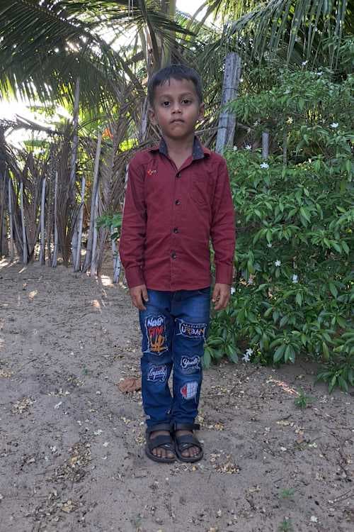 An unsponsored boy named Satheeshkaran from Sri Lanka who has waited 561 days for a sponsor.