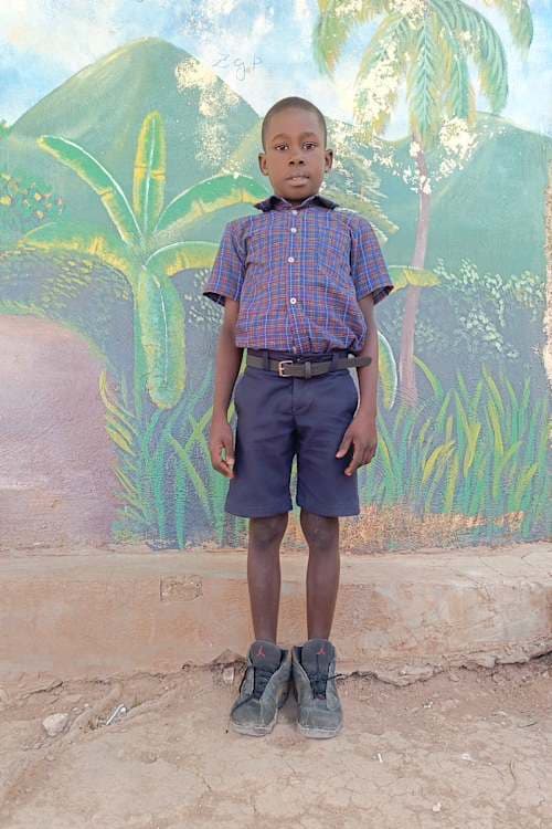 An unsponsored boy named Loubens from Haiti who is vulnerable to exploitation and has waited 579 days for a sponsor.