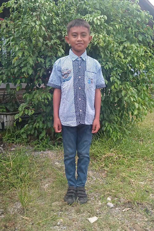 An unsponsored boy named Galang from Indonesia who has waited 419 days for a sponsor.