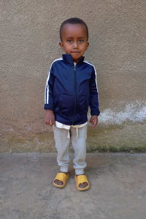 An unsponsored boy named Muluken from Ethiopia who lives in an AIDS-affected area, is vulnerable to exploitation and has waited 565 days for a sponsor.