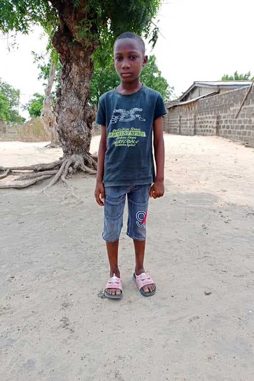 An unsponsored boy named Selasi from Ghana who lives in an AIDS-affected area and has waited 469 days for a sponsor.